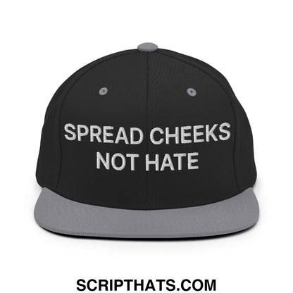 Black snapback cap with gray brim and button featuring white embroidered spread cheeks not hate text