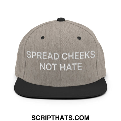 Gray and black snapback hat with white embroidered text spread cheeks not hate on a flat bill brim design