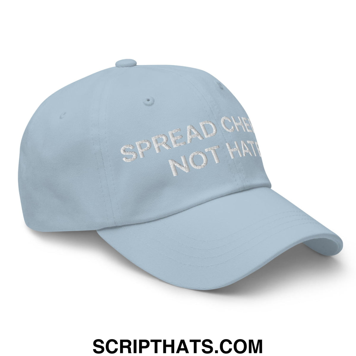 Light blue unstructured dad hat featuring white embroidered text spread cheer not hatred for casual wear