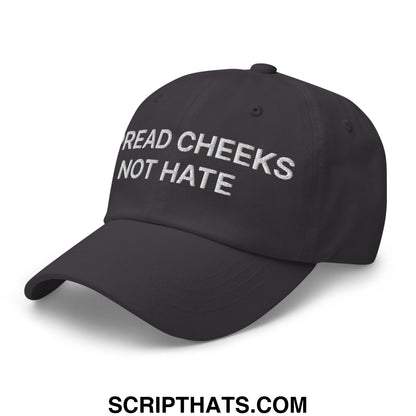 Black unstructured dad hat with white embroidered text reading read cheeks not hate for casual wear