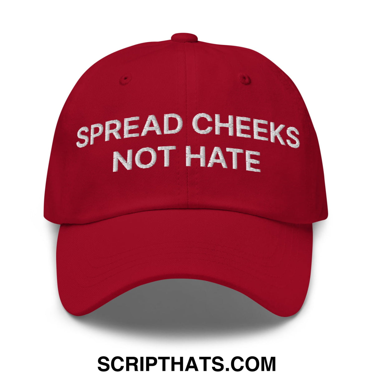 A red unstructured dad hat with white embroidered spread cheeks not hate text perfect for casual wear
