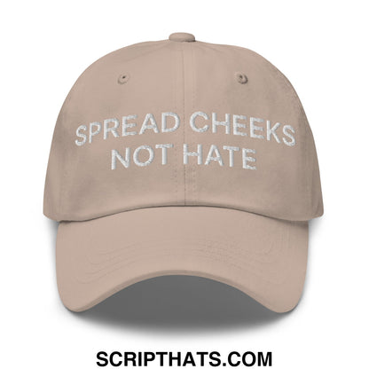 Beige unstructured dad hat with white embroidered text spread cheeks not hate featuring a casual fit