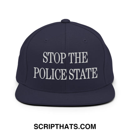 Navy blue snapback hat with white embroidered text stop the police state and flat bill brim design