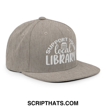 Gray snapback hat with white embroidered support your local library text and small book icon on flat bill brim