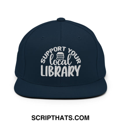 Navy blue snapback hat with white embroidered support your local library text and stack of books icon flat brim