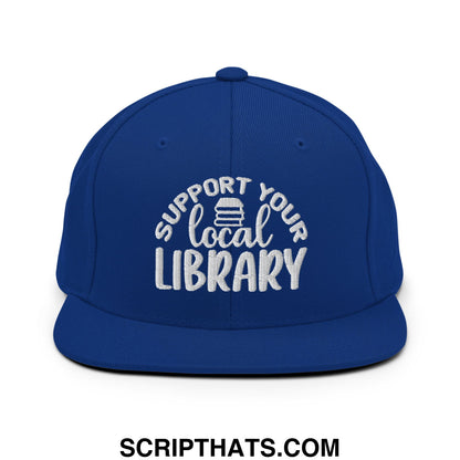 Royal blue snapback hat with white embroidered support your local library text and stack of books icon