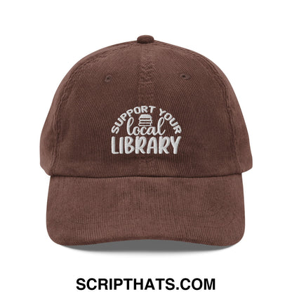 Brown corduroy unstructured dad hat with white embroidered support your local library text and small book icon
