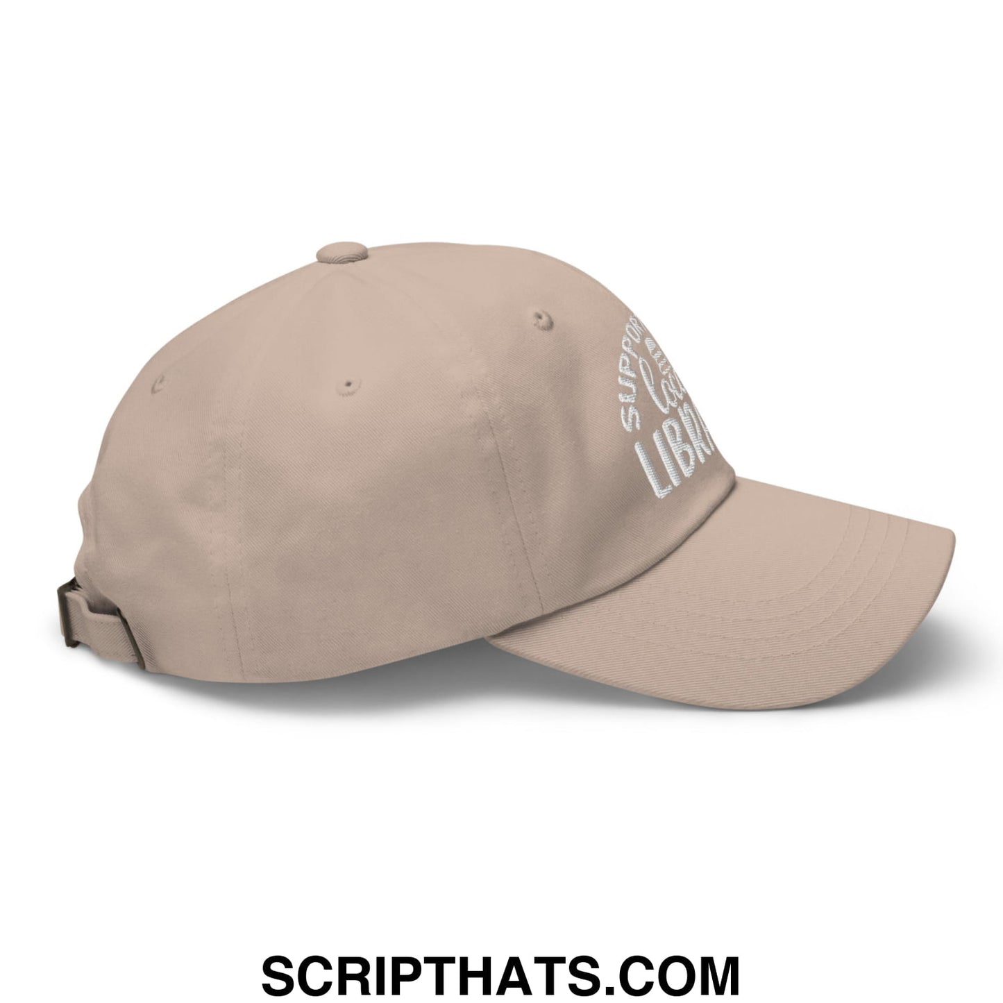 Beige embroidered unstructured dad hat with white support your local library text on the side