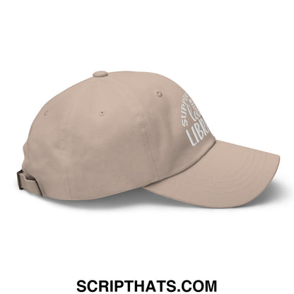 Beige embroidered unstructured dad hat with white support your local library text on the side
