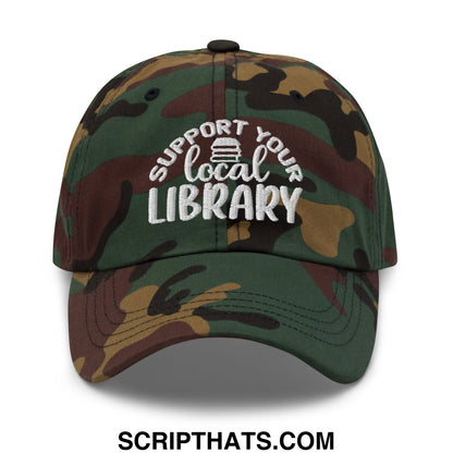 A camouflage embroidered unstructured dad hat with white support your local library text and a book icon