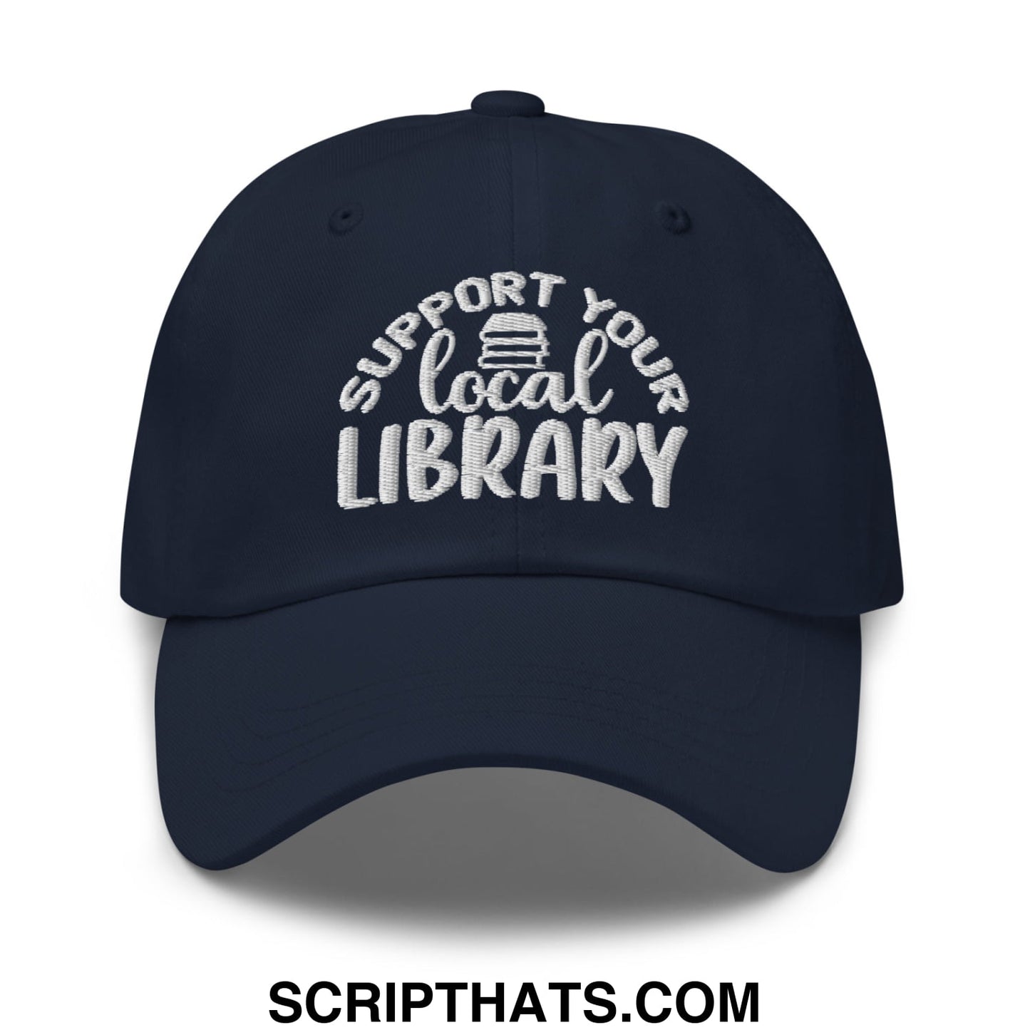 Navy blue embroidered unstructured dad hat with white support your local library text and stack of books icon