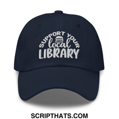 Navy blue embroidered unstructured dad hat with white support your local library text and stack of books icon
