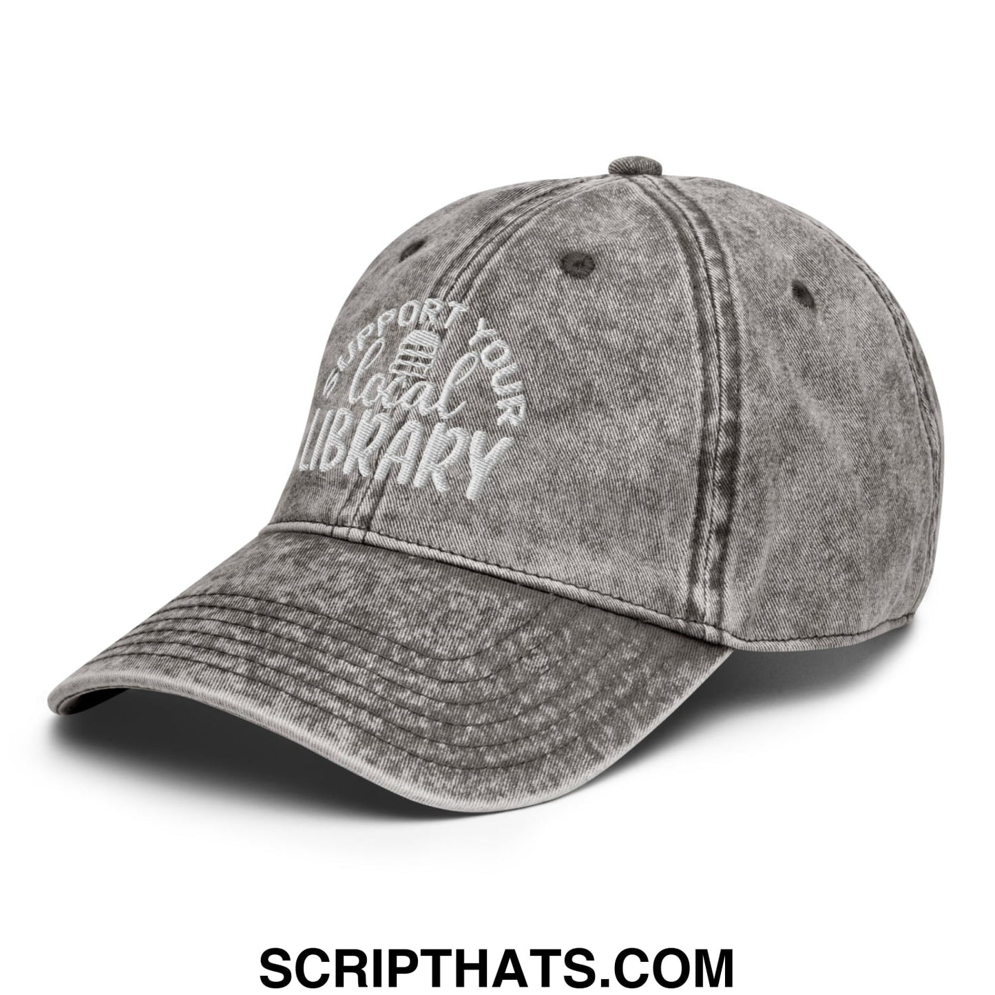 A faded gray denim dad hat with white embroidered support your local library text and a small library icon