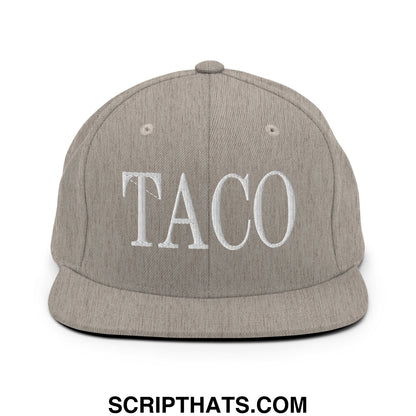 Gray snapback hat with white embroidered taco lettering and flat bill brim for casual wear