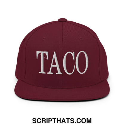 Maroon snapback hat with white embroidered taco lettering and flat bill brim perfect for casual wear