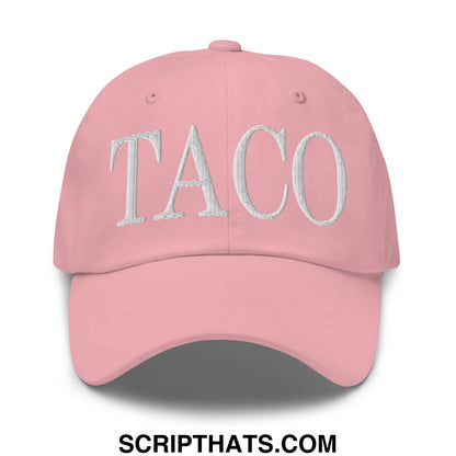 A soft pink unstructured dad hat with taco embroidered in textured silver thread on the front