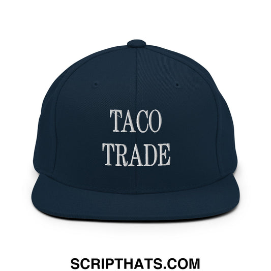 Navy blue snapback hat with white embroidered taco trade text and flat bill brim perfect for casual wear