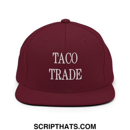 Maroon flat bill snapback hat with white embroidered taco trade text perfect for casual streetwear