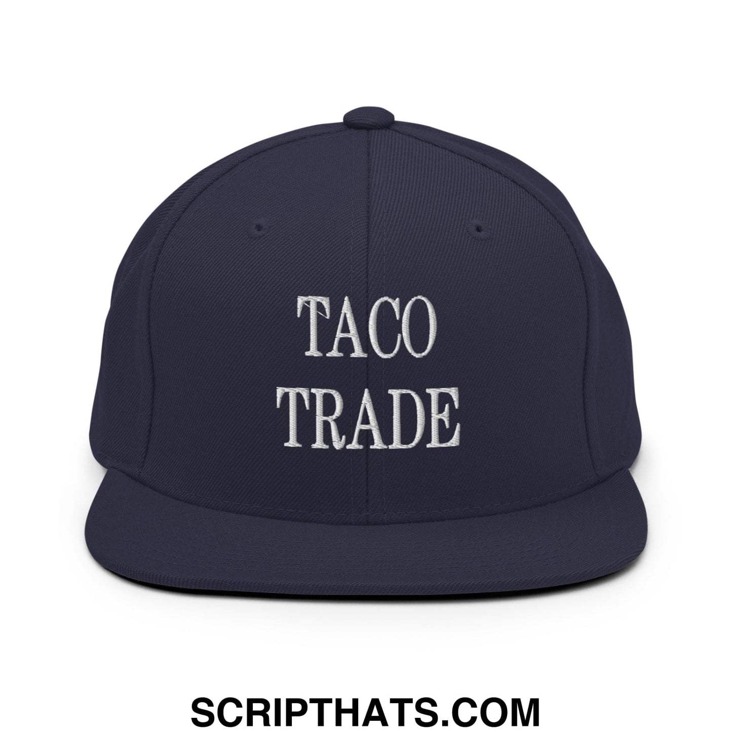 Navy blue snapback hat with white embroidered taco trade text and flat bill brim in cotton material