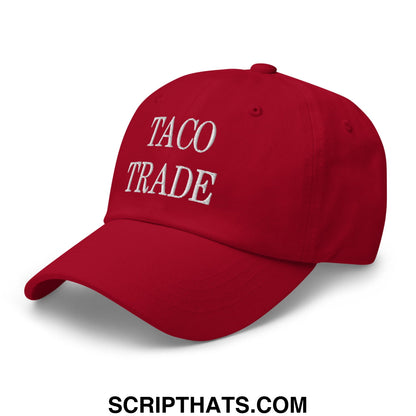 Red unstructured dad hat with taco trade embroidered in white thread across the front ideal for casual wear