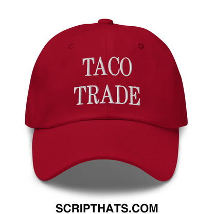 Red unstructured dad hat with taco trade embroidered in white thread across the front for casual wear