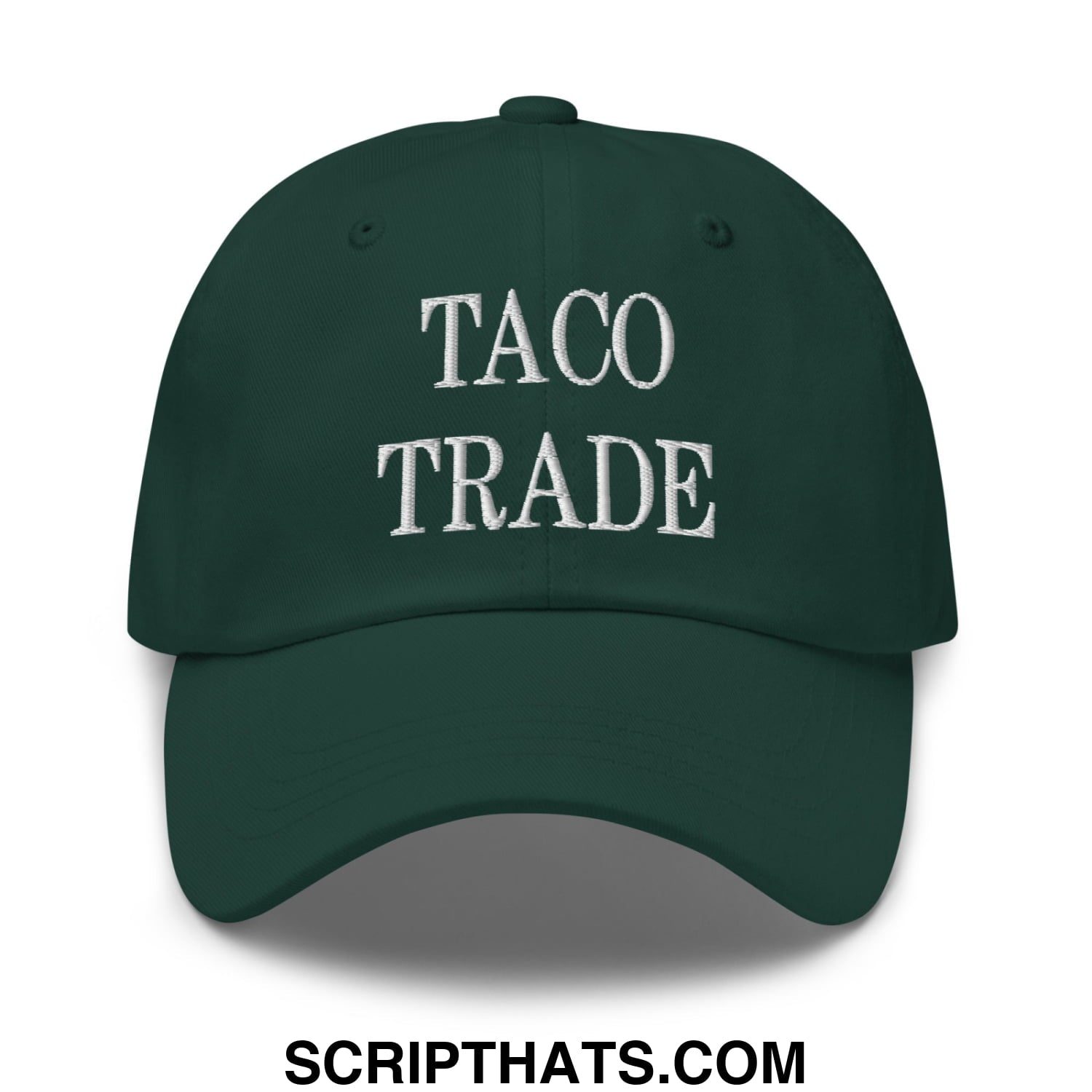 Dark green unstructured dad hat with taco trade embroidered in white thread across the front