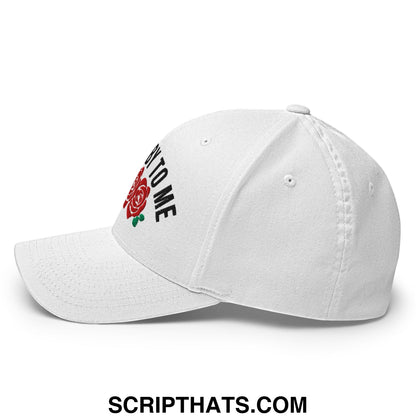 White stretch fit golf hat with embroidered red rose and black rose to me text from talk derby to me collection