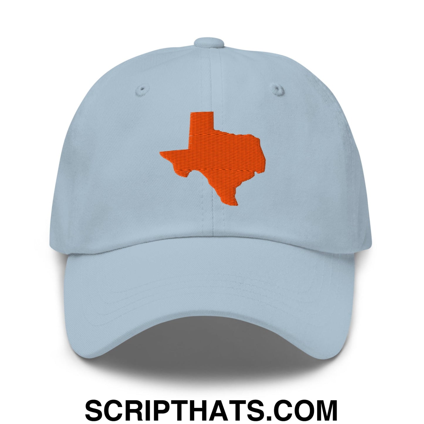 Light blue dad hat with an orange embroidered outline of the Texas state silhouette on front panel