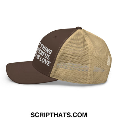Brown and tan mesh trucker hat with white embroidered text anything powerful is love on front panel