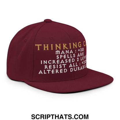 Maroon Thinking Cap Diablo snapback hat with gold white embroidered text and game style mana and spell stats
