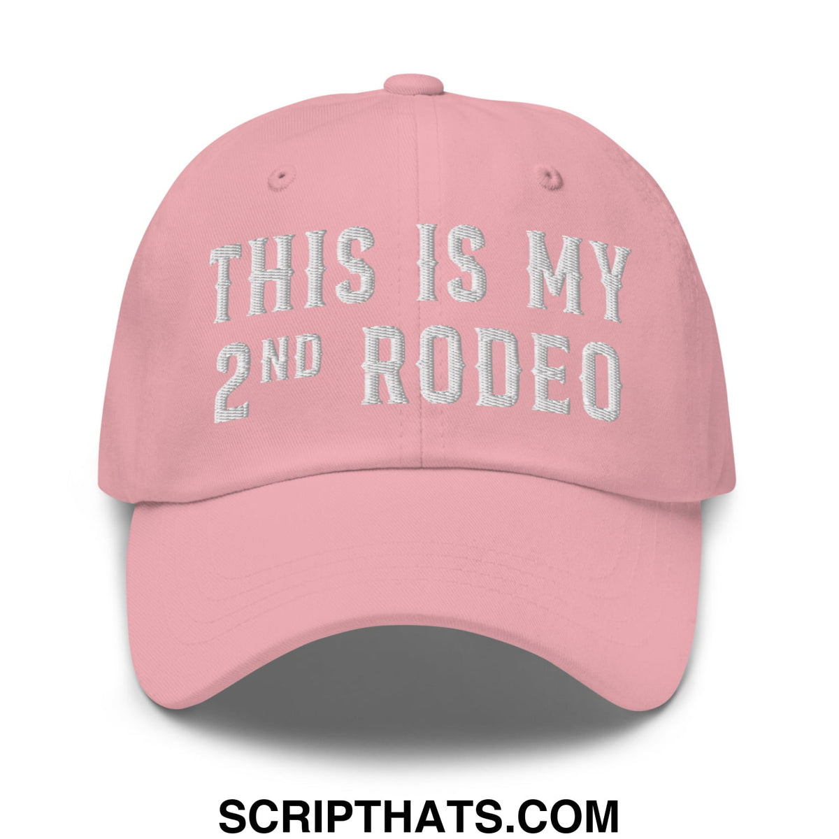 A soft pink unstructured dad hat with white embroidered text this is my 2nd rodeo called this is my second rodeo embroidered dad hat