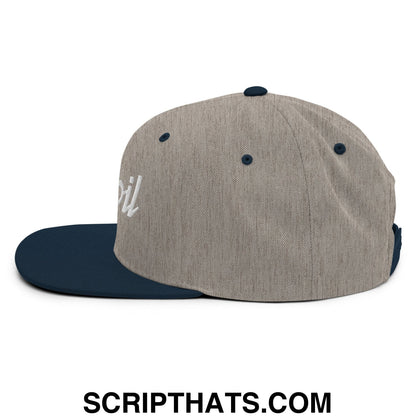 A heather gray tinfoil sports snapback hat with navy blue flat bill brim and white script embroidery on the side