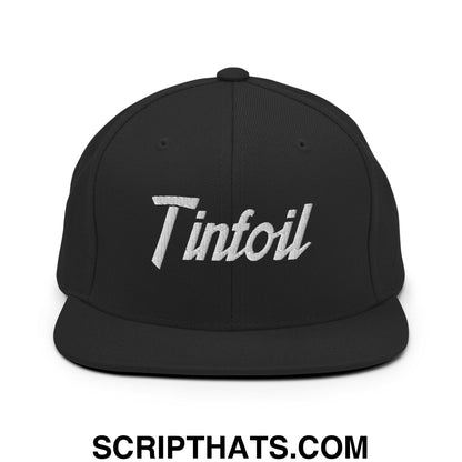 Black snapback hat with white embroidered tinfoil script logo and flat bill brim for sportswear style