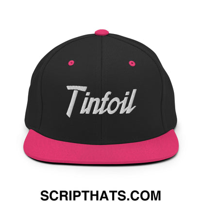 Black snapback cap with vibrant pink flat bill brim and matching button, tinfoil embroidered in silver script