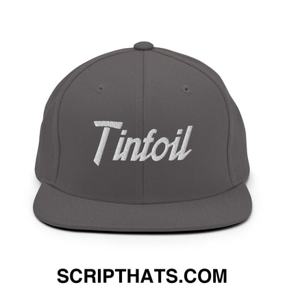 Gray snapback hat with white embroidered tinfoil sports script and flat bill brim for casual wear