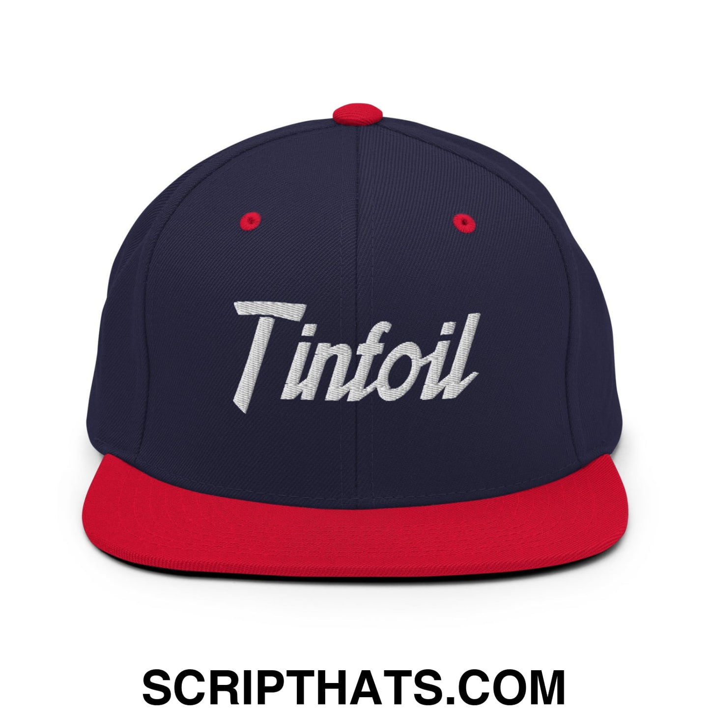 Navy blue snapback hat with red flat bill brim and white embroidered tinfoil sports script logo