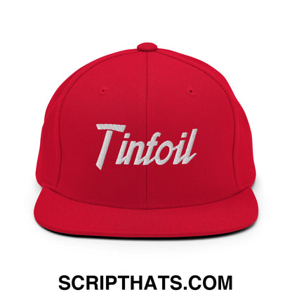 Red snapback cap with white embroidered tinfoil logo and flat bill brim from tinfoil sports script collection