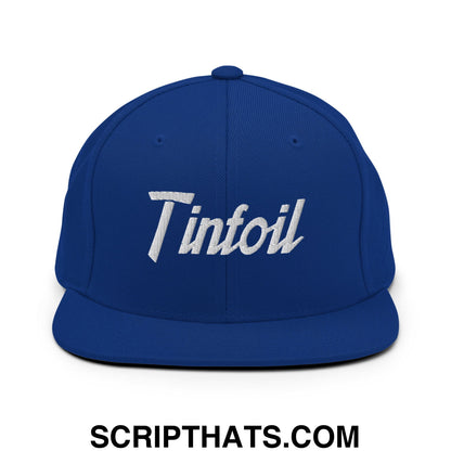Royal blue snapback hat with white embroidered tinfoil sports script logo and flat bill brim for casual wear