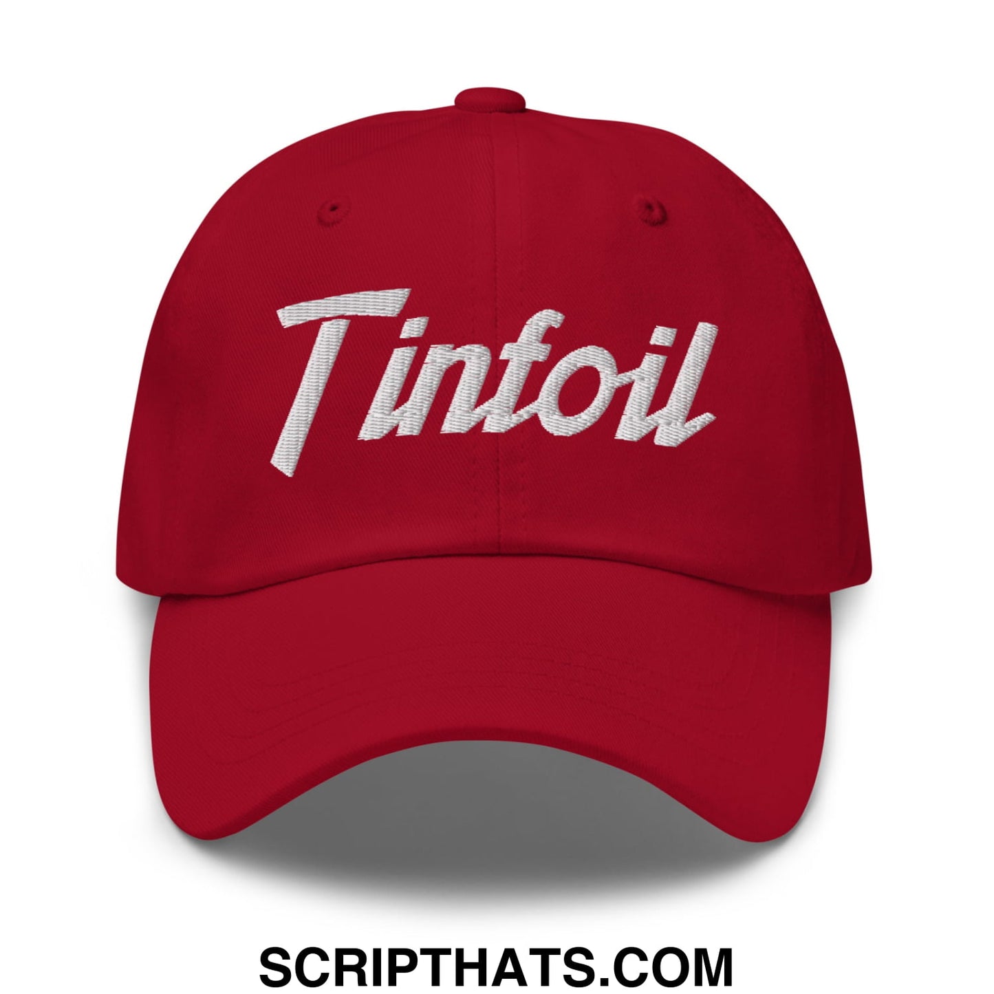Red baseball dad hat with white embroidered tinfoil sports script logo in unstructured design