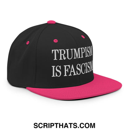Black snapback cap with vibrant pink brim and button featuring white embroidered trumpism is fascism text