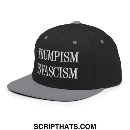Black and gray snapback cap with white embroidered trumpism is fascism text on flat bill brim for casual wear