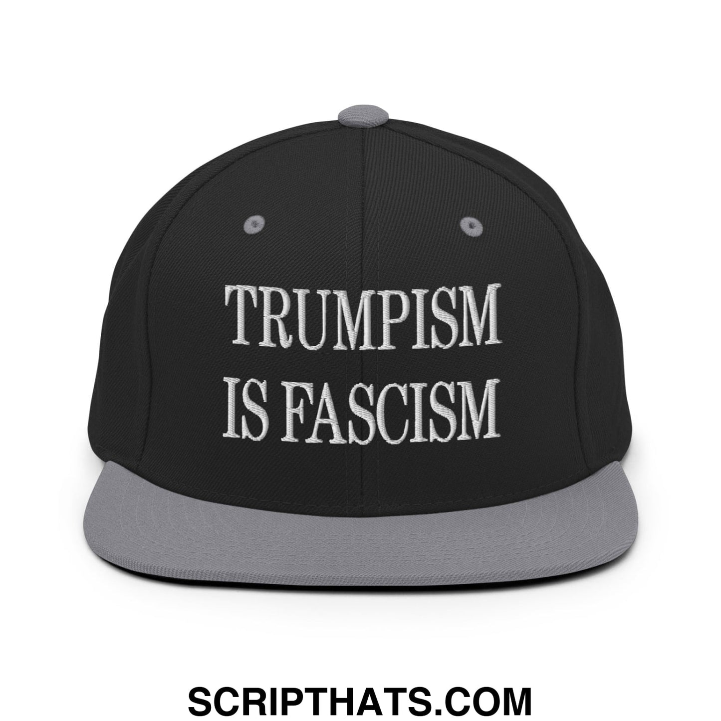 Black snapback cap with gray brim and white embroidered trumpism is fascism text in classic serif font
