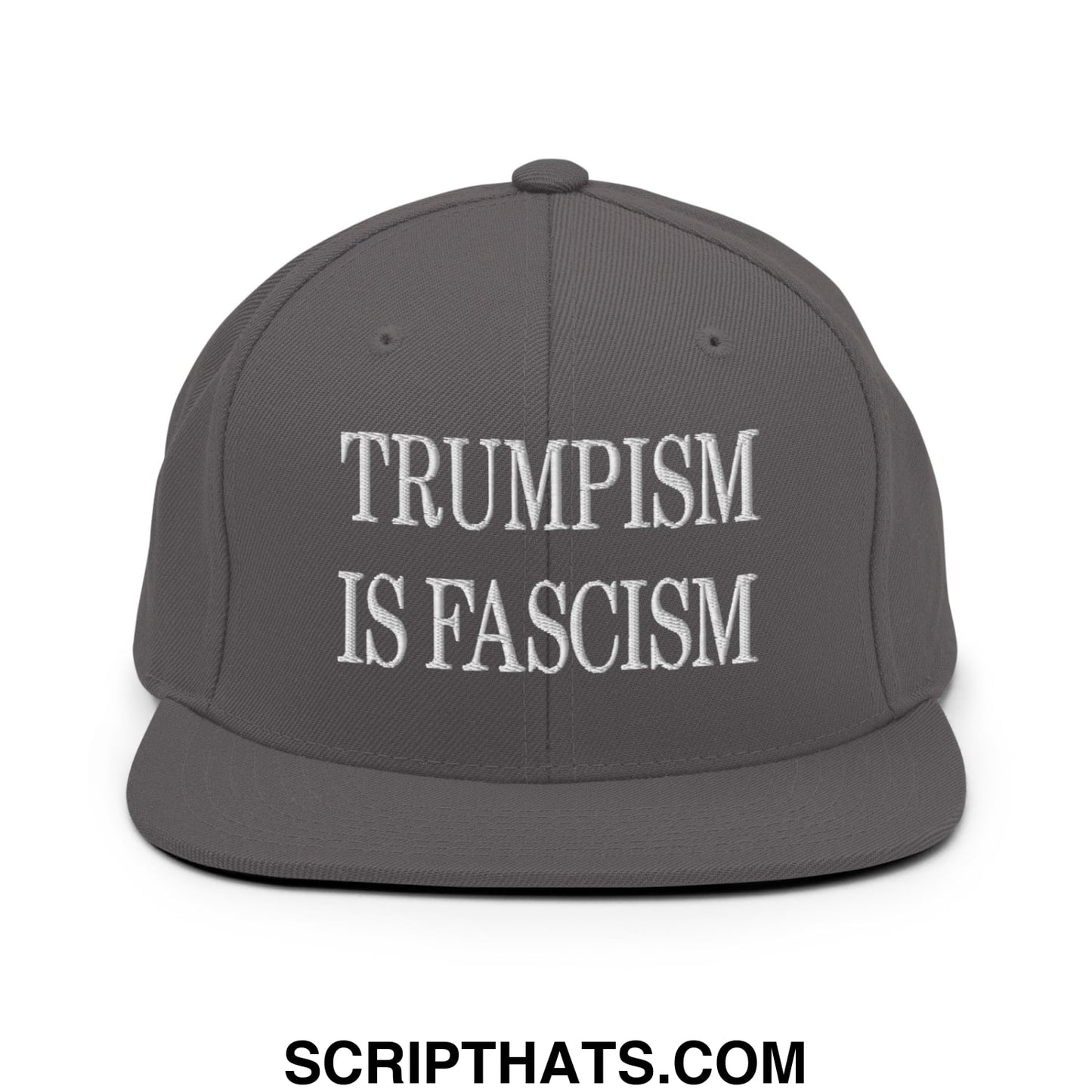 Dark gray snapback hat with white embroidered text trumpism is fascism on a flat bill brim design