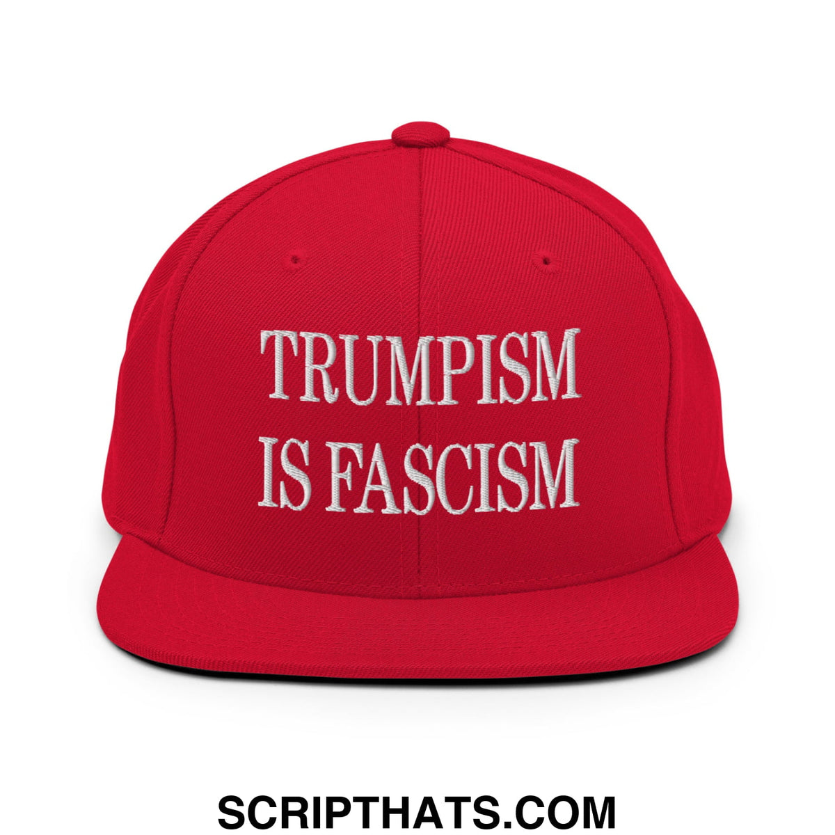 Red snapback cap with flat bill brim and white embroidered text reading trumpism is fascism in bold letters