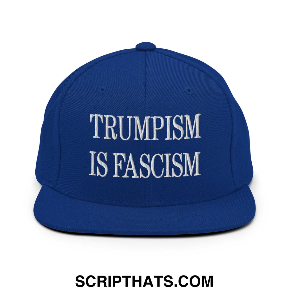 Royal blue snapback cap with white embroidered text trumpism is fascism and flat bill brim design