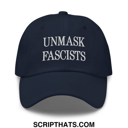 Navy blue unstructured dad hat with white embroidered text unmask fascists featuring a casual fit design