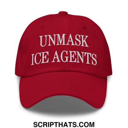 Red unstructured dad hat with white embroidered unmask ice agents text on front panel