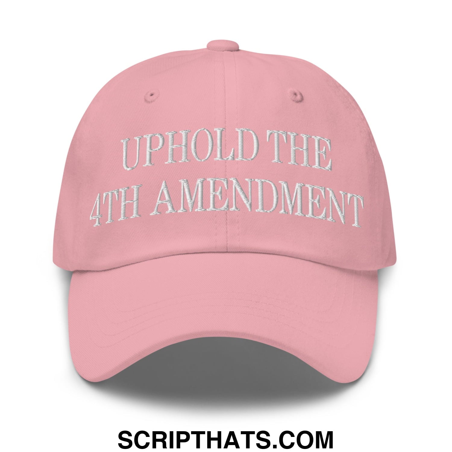 A soft pink unstructured dad hat with uphold the 4th amendment embroidered in white thread on the front