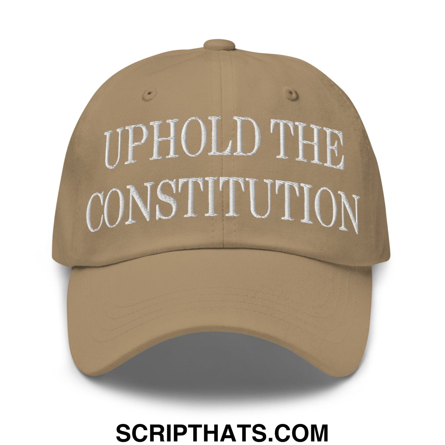 Tan unstructured dad hat with white embroidered text uphold the constitution on the front panel