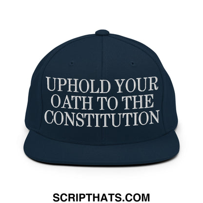 Navy blue snapback hat with white embroidered uphold your oath to the constitution text and flat bill brim